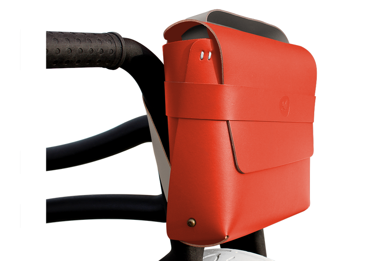Red leather bike bag on children's bike