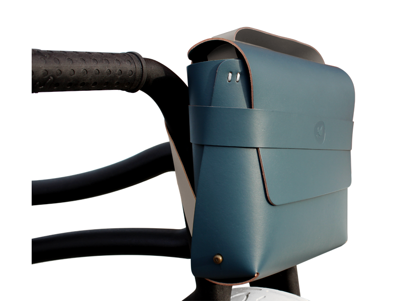 Blue leather bike bag on child's trike