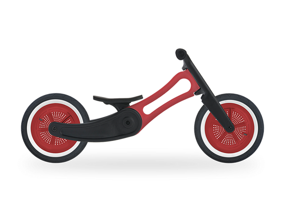 red and black recycled plastic running bike in low mode