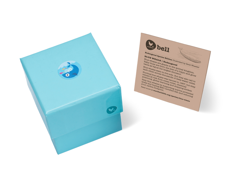 Aqua gift box with fact card on blue whales